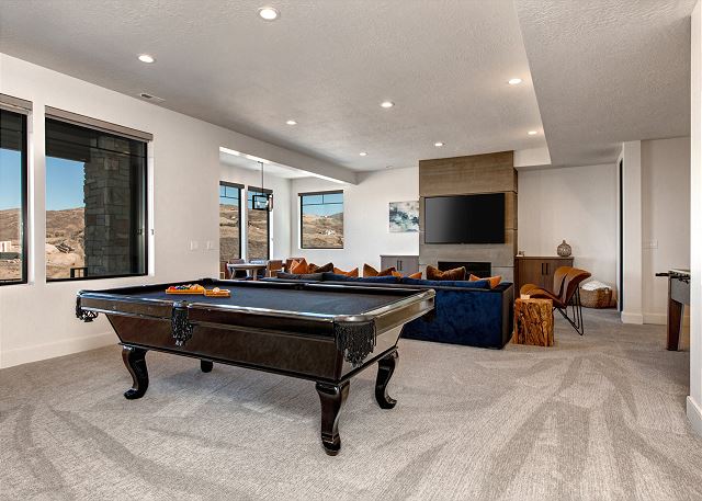 Lower Level Living Room and Game Room with Pool Table, Foosball Table, Game/Dining Table and Plenty of Seating