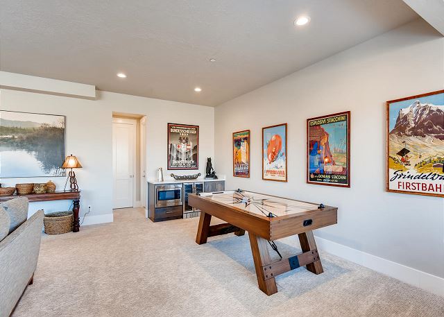 Lower Level Family Room with Gas Fireplace, Large TV, Comfortable Seating/Gathering and an Air Hockey Table!