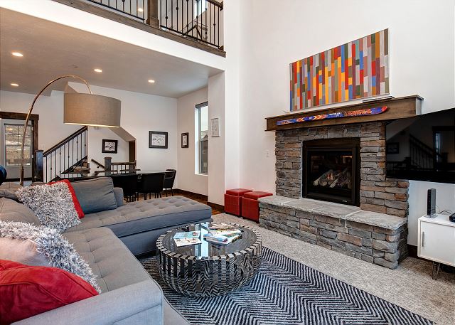 Main Living Room with Gas Fireplace, Large Sectional Sofa and TV