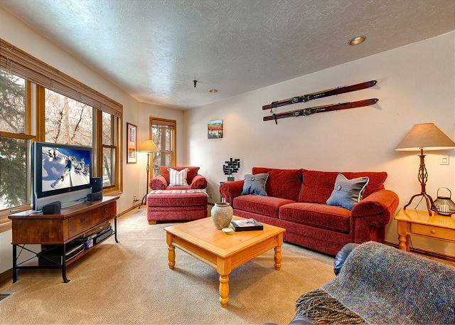 Living Room - wood-burning fireplace, plenty of seating, HD TV with Comcast cable, Queen sleeper sofa