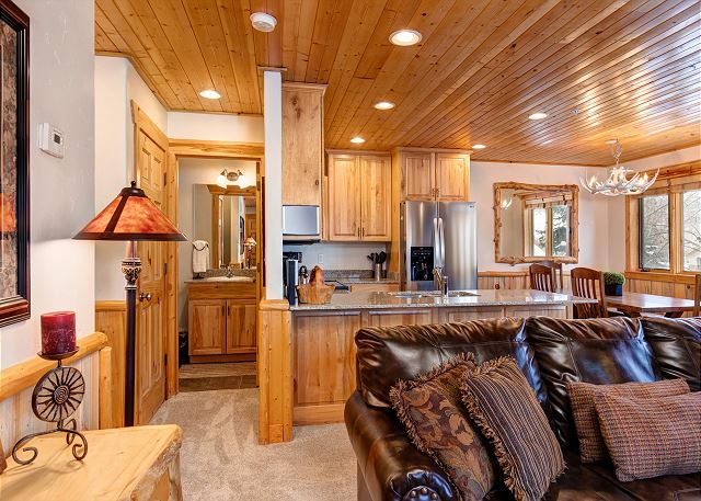 Open Living, Kitchen, Dining Area with Large Smart TV, Gas Fireplace and Deck with BBQ