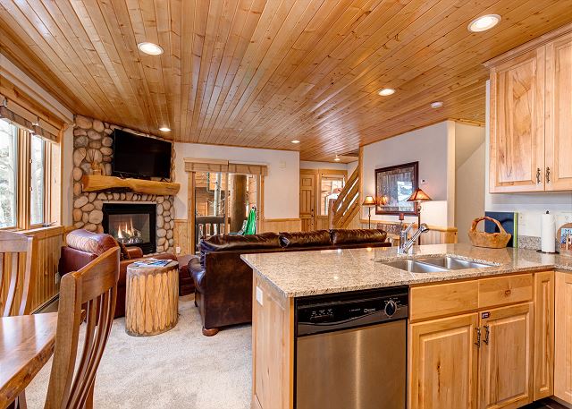 Open Living, Kitchen, Dining Area with Large Smart TV, Gas Fireplace and Deck with BBQ