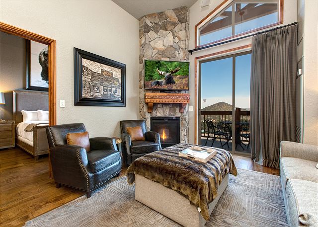 Living Room with Sleeper Sofa, TV, Gas Fireplace and Balcony