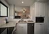 Fully equipped kitchen with stainless steel appliances