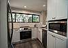 Fully equipped kitchen with stainless steel appliances