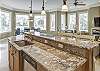 Large granite island perfect to meet & mingle - 1st floor