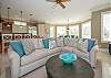 Spacious living area enlightened by oversize windows - 1st floor