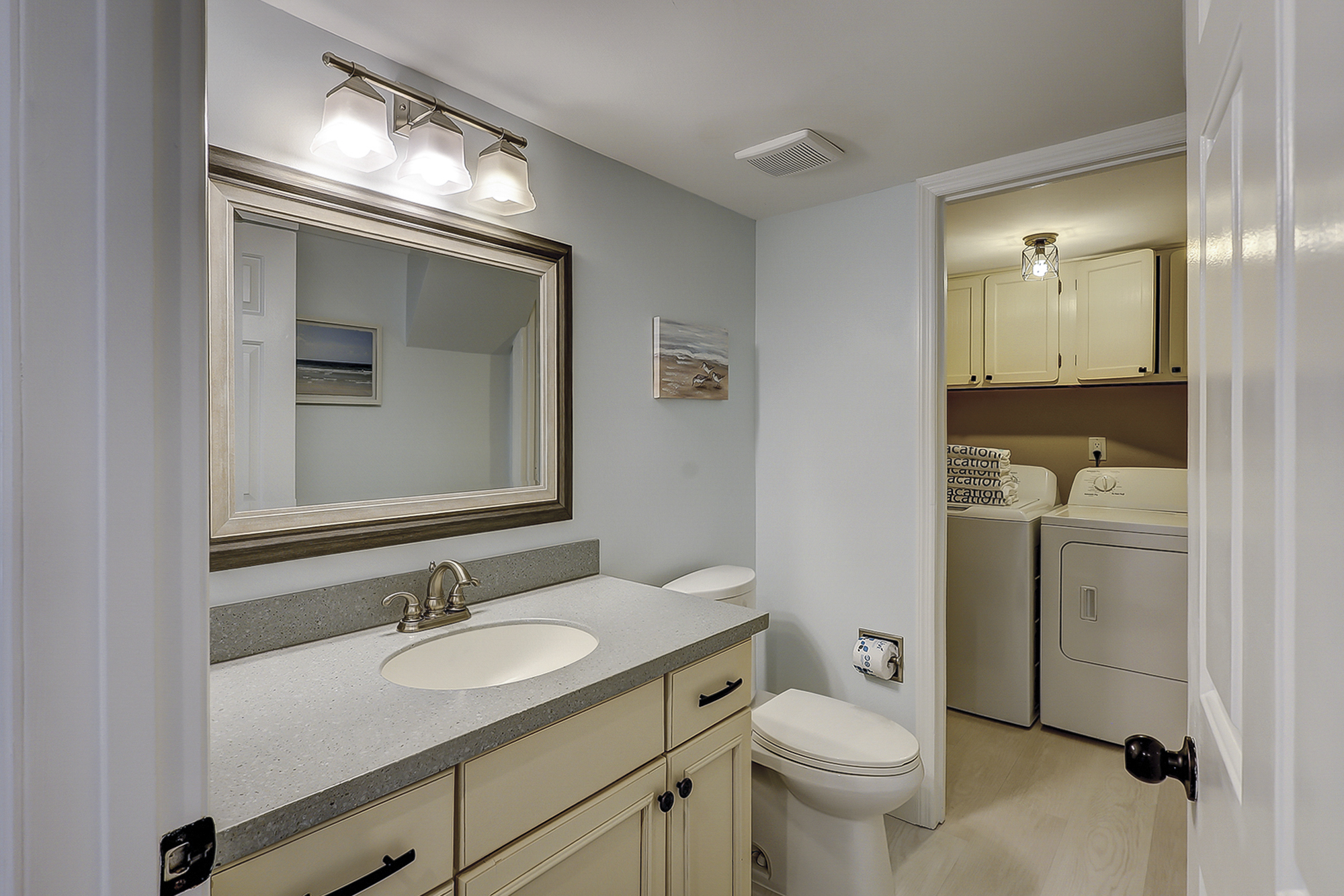 First Floor Powder Room and Laundry Area