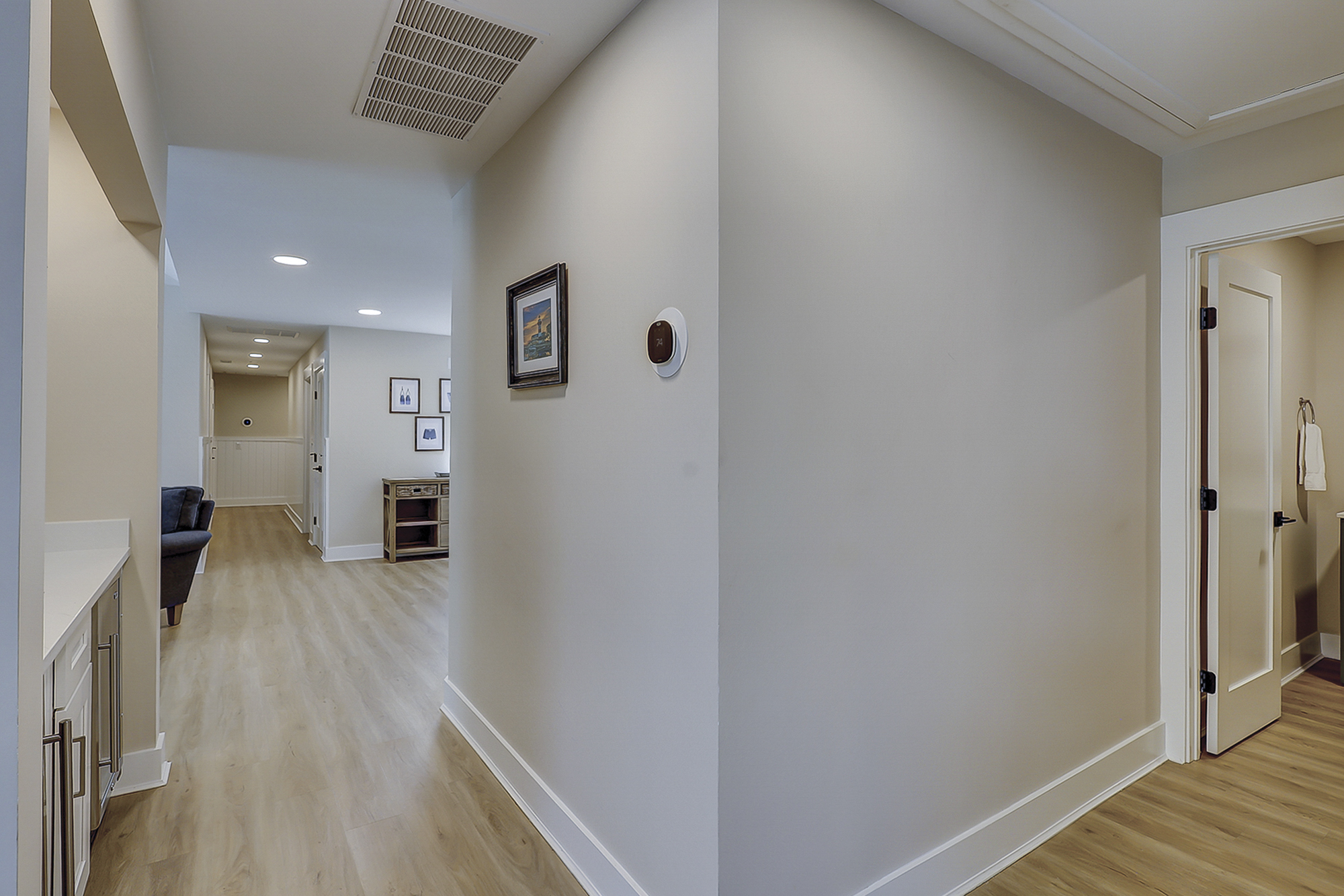 Hallway to Kitchen and Half Bath