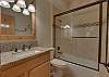 shared full bathroom off of living room 