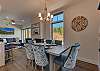 Sunny open dining area kitchen and living room 