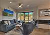 Sunny open dining area kitchen and living room 