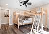 Bedroom 3 with a queen below the 2 twin bunks. 