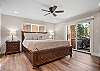 Master bedroom, king bed, with ensuite bathroom, door to patio 