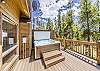 Private hot tub on gorgeous patio in wooded area.