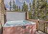 Hot tub in the woods.