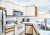Kitchen-
Full size appliances as well as toaster, coffee maker, and a variety of kitchen essentials.