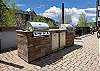Fraser Crossing amenity deck with OVERSIZED hot tub, fire place and BBQ's for all guests to enjoy