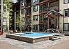 Fraser Crossing amenity deck with OVERSIZED hot tub, fire place and BBQ's for all guests to enjoy