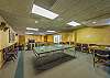 Game Room-
Located on the lobby level of the C Building with a ping pong table, seating are, large TV, and card table for board games.
