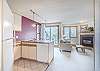 Kitchen-
Full size appliances, double sink, and pendant lighting.