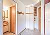 Entry/Bathroom-
The bathroom vanity area located nest to the entry.