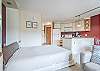 Murphy Bed-
Living, Dining, and Kitchen areas are still accessible with Murphy bed in use.
