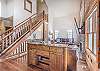 Stairs-
Beautiful log rail staircase leads to the top floor.