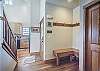Entry-
Includes a bench and coat hooks.