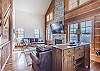 Living Area-
Plenty of natural lighting with multiple windows.