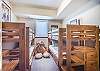 Second Bedroom-
Located on the lower level with two twin-over-twin bunks, flat screen TV, and an en-suite bathroom.