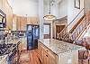 Kitchen-
Large counter space and a variety of cooking utensils and accessories.