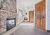 Master Bedroom-
Private fireplace, en-suite bathroom, and access to a private patio with hot tub can be found in the master bedroom on the lower level.