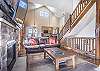 Living Area-
Immediate access to both staircases from the living area.