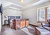 Master Bedroom-
King bed, dresser, and flat screen TV.
