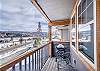 Accessed through the living area with patio style seating and a grill.