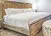 This is an example of the Triple Sheet Method.  This photo is not from this property.  
This property uses the Triple Sheet Method where we use two sheets to encase the comforter.  This sheet-made duvet cover gets washed between each and every guest to provide an extra clean sleeping experience.  