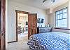 Located off the dining area.

Not shown:  This property uses the Triple Sheet Method where we use two sheets to encase the comforter.  This sheet-made duvet cover gets washed between each and every guest to provide an extra clean sleeping experience.  
