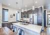 Stainless steel appliances, and granite counters