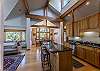 Kitchen-
Located just next to the dining area with vaulted ceiling and sky lights.