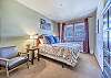 Master Bedroom-
Queen bed, large window with views, and flat screen TV.
