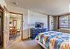 Second Bedroom-
Located off the dining area with a queen bed as well as a twin bed with twin trundle below. 