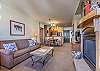 Living Area-
Queen sofa sleeper, flat screen TV, and gas fireplace. 
