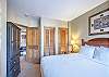 Master Bedroom-
Located next to the hall bathroom with a queen bed.

This property uses the Triple Sheet Method where we use two sheets to encase the comforter.  This sheet-made duvet cover gets washed between each and every guest to provide an extra clean sleeping experience.  