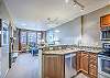 Kitchen-
Granite counters, track lighting, and full size appliances. 