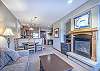 Living Area-
Part of an open floor plan along with the dining area and kitchen.