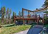 Large deck area with outdoor dining options.