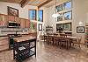 Kitchen and dining area located on the main level of the home. Dining table offers seating for 8.