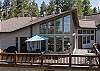 Aerial view of the large deck complete with seating, propane grill, multiple access points, and great views. 