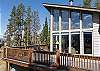 Exterior view of the large deck peeking into the living area.